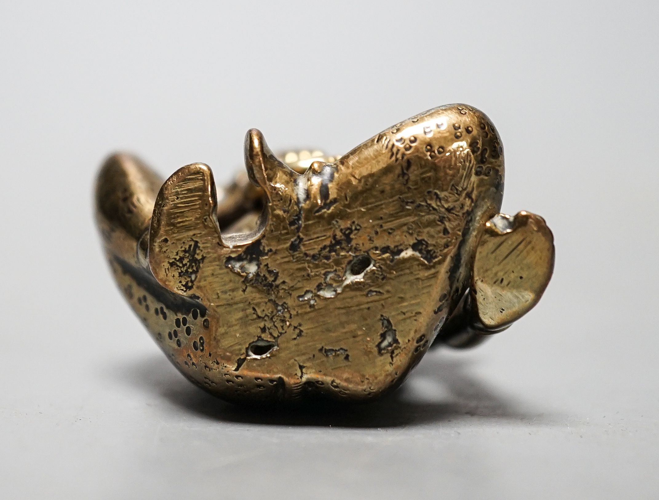 A 19th century bronze Buddhist seated figure 5.5cm